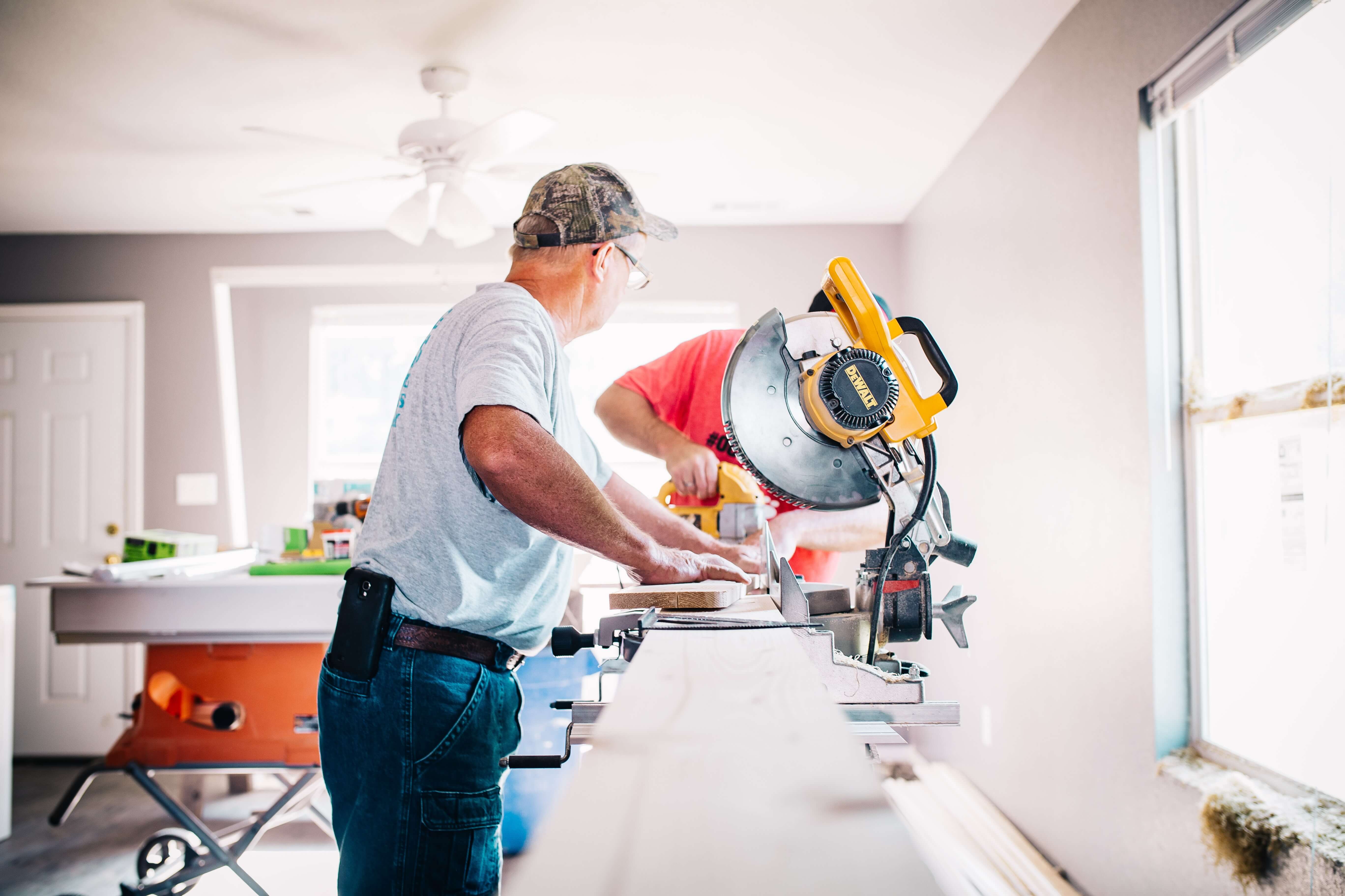 Man using a miter saw